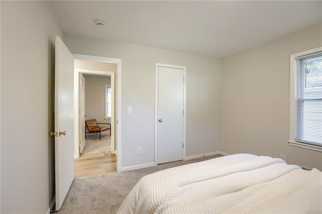 10201 Hillcrest Rd, Kansas City, MO 64134 - bedroom featuring light colored carpet and baseboards