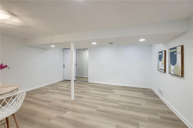 10201 Hillcrest Rd, Kansas City, MO 64134 - finished basement featuring light wood-style flooring and recessed lighting