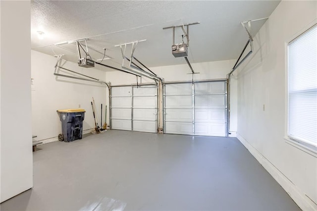 10201 Hillcrest Rd, Kansas City, MO 64134 - garage with a garage door opener