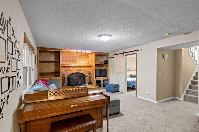 820 S Virginia Ln, Olathe, KS 66061 - living area with stairway, light carpet, a barn door, and a textured ceiling