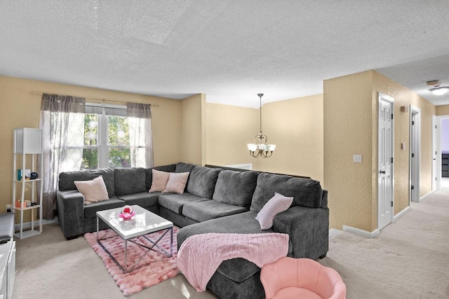 820 S Virginia Ln, Olathe, KS 66061 - living room featuring light colored carpet, a chandelier, and a textured ceiling