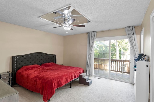820 S Virginia Ln, Olathe, KS 66061 - carpeted bedroom featuring access to outside, a textured ceiling, and ceiling fan