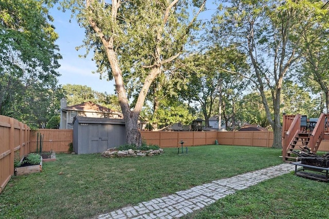 820 S Virginia Ln, Olathe, KS 66061 - fenced backyard with a storage shed and stairs