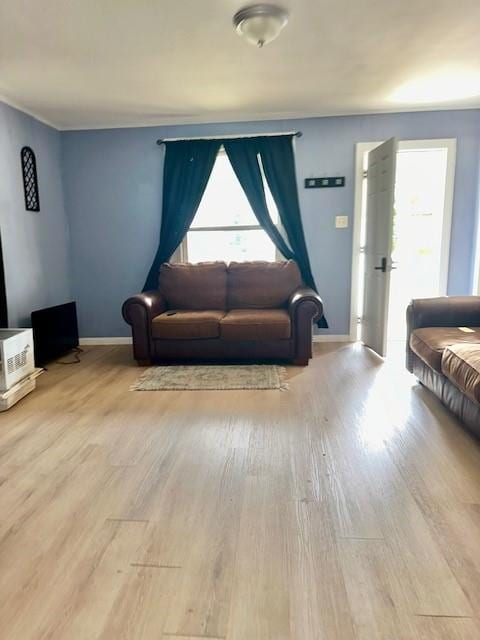 522 S 11th St, Independence, KS 67301 - living room with wood finished floors