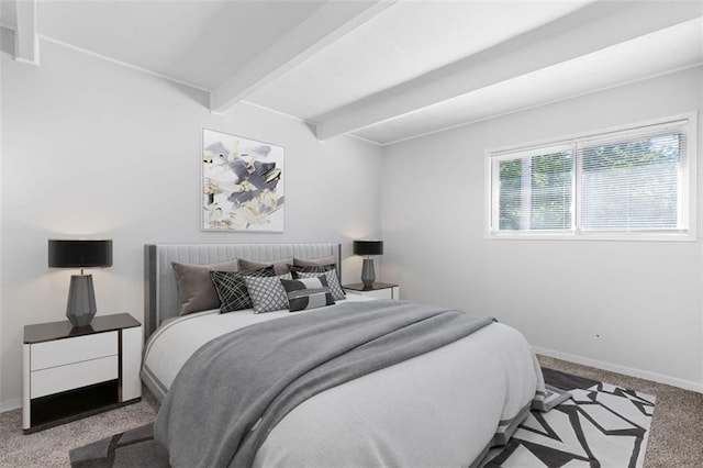 2410 38th St, Kansas City, KS 66104 - carpeted bedroom featuring beamed ceiling and baseboards