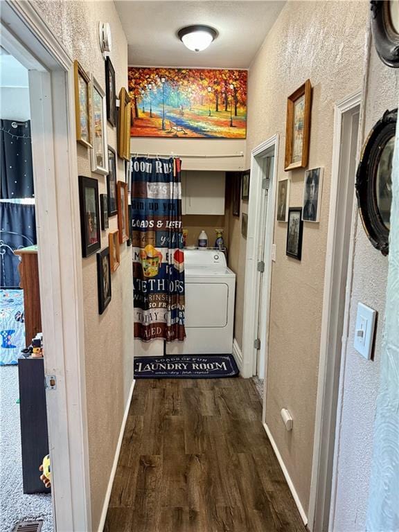 715 Harmon St, Saint Joseph, MO 64504 - hall featuring a textured wall, dark wood-style floors, and washer / dryer