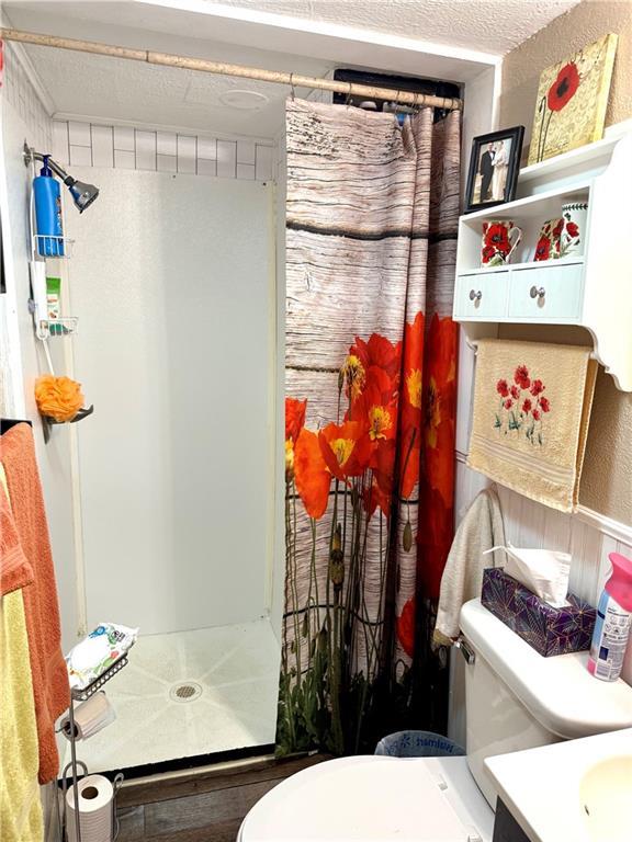 715 Harmon St, Saint Joseph, MO 64504 - bathroom featuring a stall shower and vanity