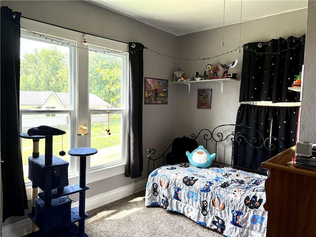 715 Harmon St, Saint Joseph, MO 64504 - carpeted bedroom featuring baseboards