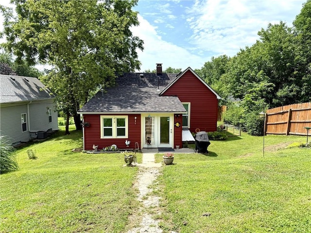 715 Harmon St, Saint Joseph, MO 64504 - view of front of property with roof with shingles and a chimney