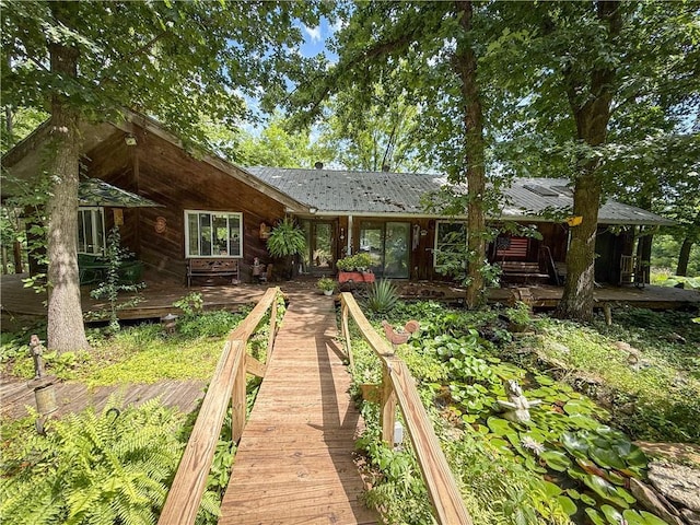 24604 E 327th St, Harrisonville, MO 64701 - rear view of house with a deck