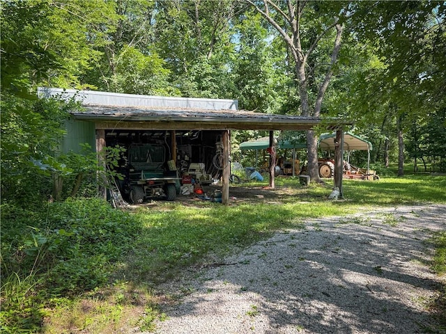 24604 E 327th St, Harrisonville, MO 64701 - view of yard featuring an outbuilding, a detached carport, and a pole building