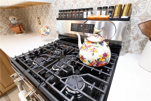 12408 Monroe Ave, Grandview, MO 64030 - kitchen view of stainless steel range with gas stovetop