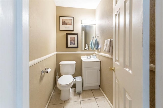 12408 Monroe Ave, Grandview, MO 64030 - half bath featuring vanity and tile patterned floors