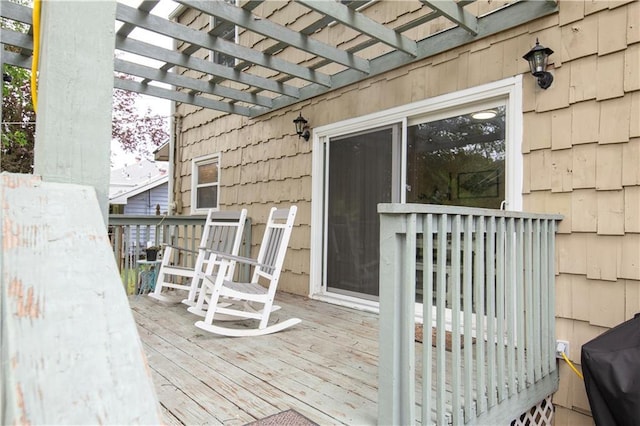 12408 Monroe Ave, Grandview, MO 64030 - wooden terrace with a pergola