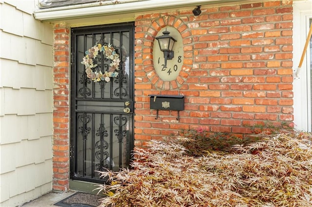 12408 Monroe Ave, Grandview, MO 64030 - entrance to property with brick siding