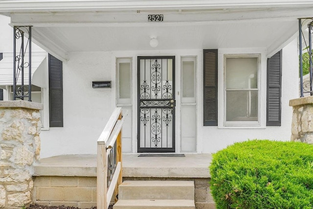 2527 N 18th St, Kansas City, KS 66104 - entrance to property with stucco siding
