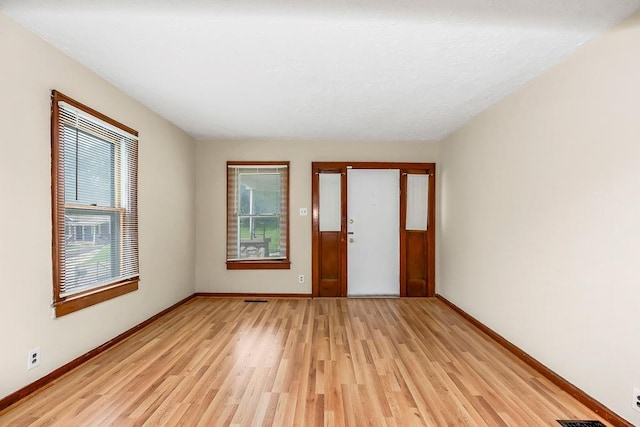 2527 N 18th St, Kansas City, KS 66104 - entryway with healthy amount of natural light and light wood-style flooring