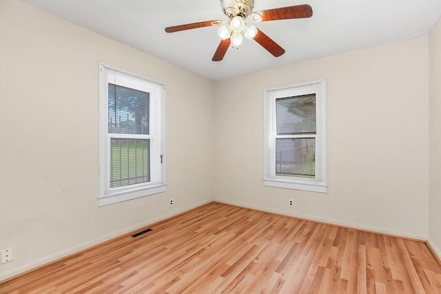 2527 N 18th St, Kansas City, KS 66104 - unfurnished room with light wood finished floors and a ceiling fan