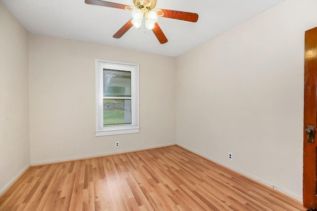 2527 N 18th St, Kansas City, KS 66104 - spare room with wood finished floors and a ceiling fan