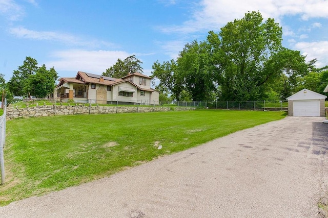 2527 N 18th St, Kansas City, KS 66104 - view of yard featuring a garage and an outdoor structure