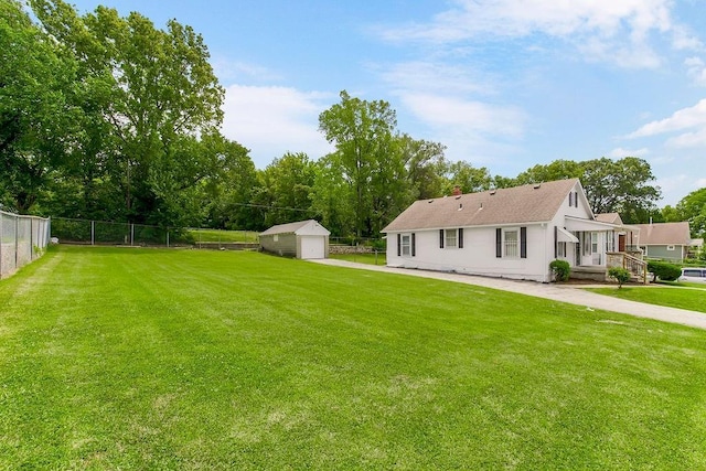 2527 N 18th St, Kansas City, KS 66104 - view of yard with an outbuilding and a garage