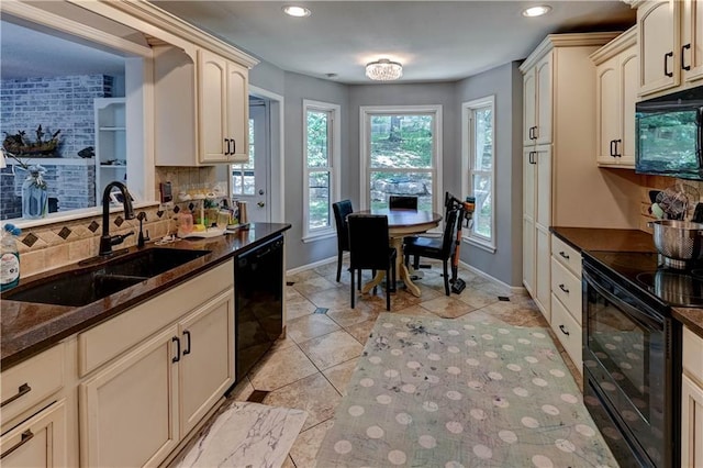 5300 NW 58th Ter, Kansas City, MO 64151 - kitchen featuring black appliances, backsplash, cream cabinets, recessed lighting, and light tile patterned flooring