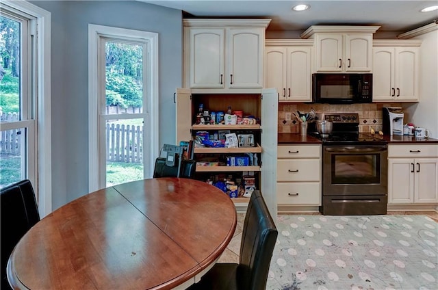 5300 NW 58th Ter, Kansas City, MO 64151 - dining space featuring recessed lighting