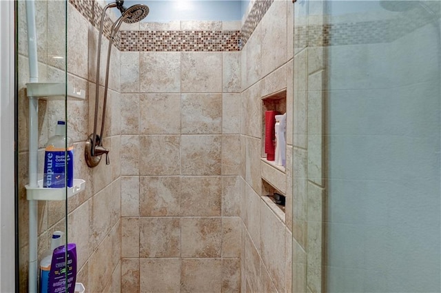 5300 NW 58th Ter, Kansas City, MO 64151 - bathroom featuring a tile shower