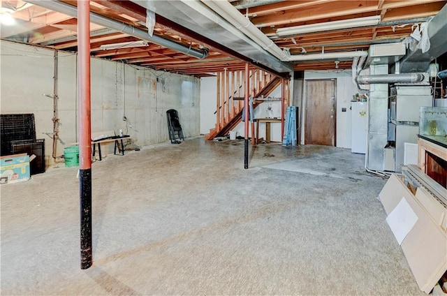 5300 NW 58th Ter, Kansas City, MO 64151 - unfinished basement with water heater and heating unit
