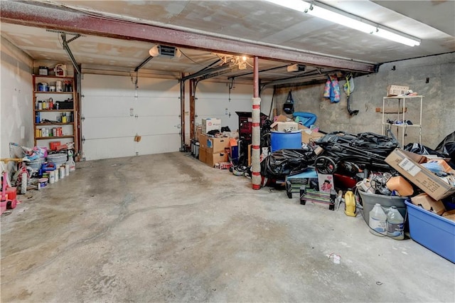 5300 NW 58th Ter, Kansas City, MO 64151 - garage featuring a garage door opener