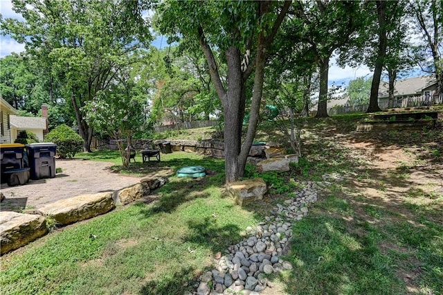 5300 NW 58th Ter, Kansas City, MO 64151 - view of yard with a patio
