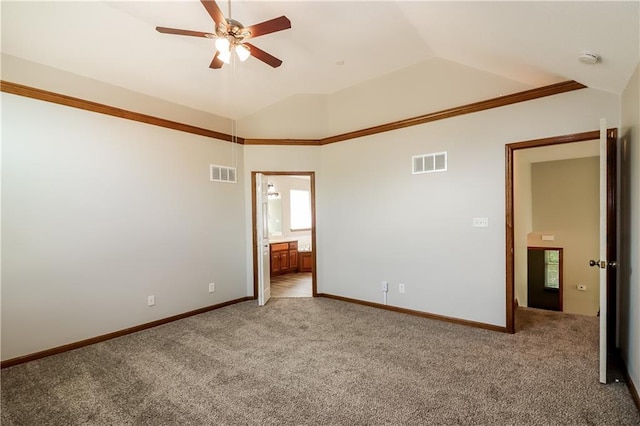 704 Canter St, Raymore, MO 64083 - empty room featuring light colored carpet, a ceiling fan, vaulted ceiling, and a smoke detector