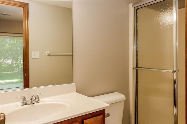 704 Canter St, Raymore, MO 64083 - full bathroom with vanity and an enclosed shower