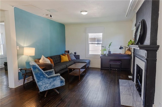 2026 E 70th Ter, Kansas City, MO 64132 - living room with a fireplace, hardwood / wood-style floors, and rail lighting
