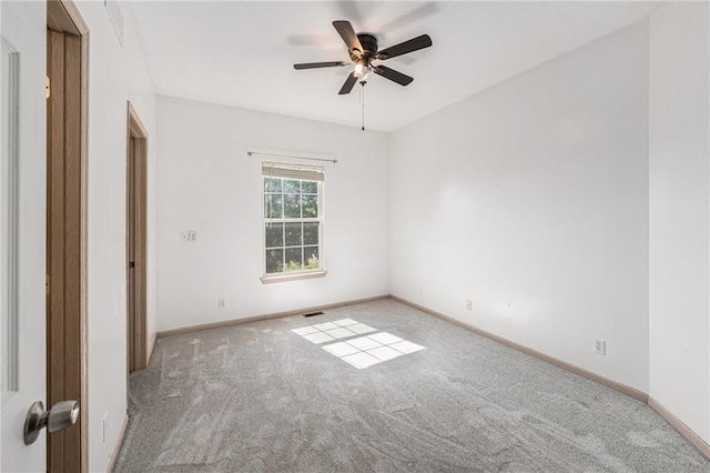 613 S Woodson Ln, Gardner, KS 66030 - empty room with carpet floors and a ceiling fan
