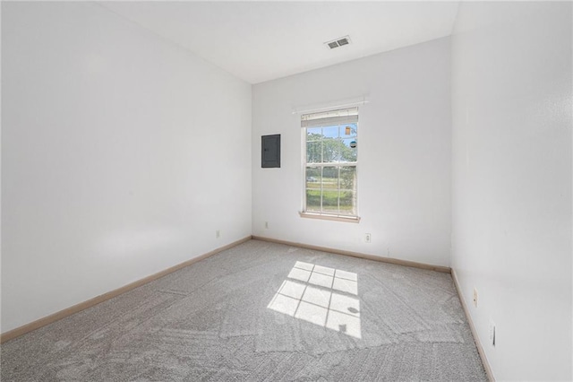 613 S Woodson Ln, Gardner, KS 66030 - carpeted spare room featuring electric panel and baseboards