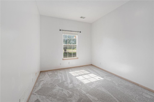 613 S Woodson Ln, Gardner, KS 66030 - spare room with carpet and baseboards
