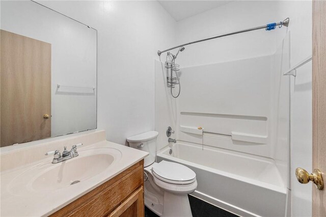 613 S Woodson Ln, Gardner, KS 66030 - full bathroom featuring vanity and shower / tub combination