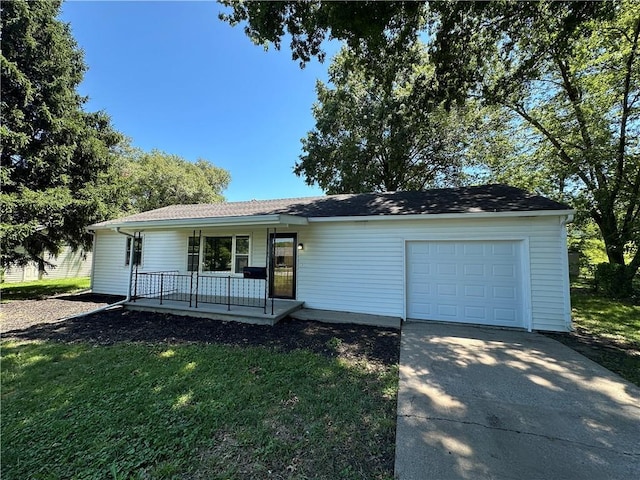 533 Utah St, Leavenworth, KS 66048 - ranch-style house with driveway, an attached garage, a porch, and a front yard