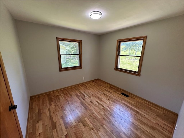 533 Utah St, Leavenworth, KS 66048 - empty room with light wood-type flooring and baseboards
