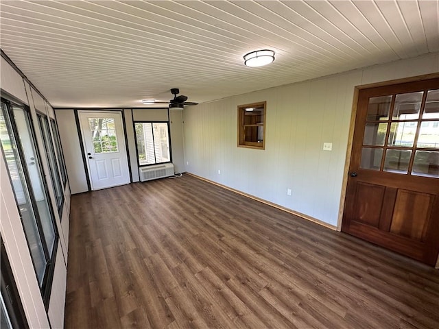 533 Utah St, Leavenworth, KS 66048 - unfurnished room featuring plenty of natural light, dark wood finished floors, wood ceiling, and a ceiling fan