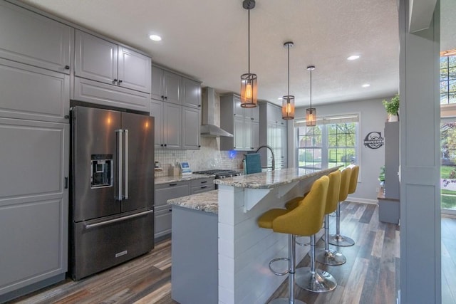 4603 N 111th St, Kansas City, KS 66109 - kitchen with high quality fridge, gray cabinetry, dark wood finished floors, and recessed lighting