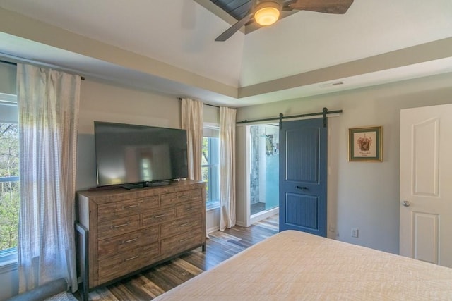 4603 N 111th St, Kansas City, KS 66109 - bedroom with wood finished floors, multiple windows, a barn door, lofted ceiling, and a ceiling fan