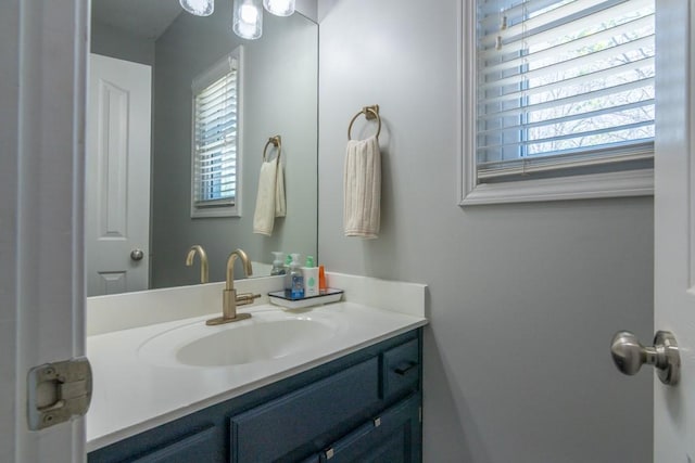 4603 N 111th St, Kansas City, KS 66109 - bathroom featuring vanity and healthy amount of natural light