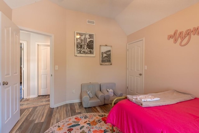 4603 N 111th St, Kansas City, KS 66109 - bedroom with lofted ceiling and wood finished floors