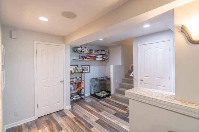 4603 N 111th St, Kansas City, KS 66109 - bar featuring wood finished floors, stairs, and recessed lighting