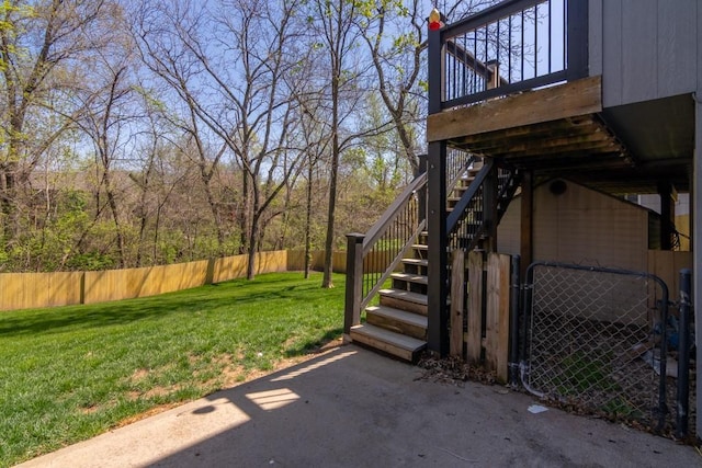 4603 N 111th St, Kansas City, KS 66109 - fenced yard featuring stairway and a patio