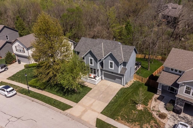 4603 N 111th St, Kansas City, KS 66109 - aerial perspective of suburban area with a forest