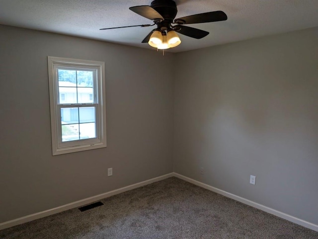 2205 S Owing St, Oak Grove, MO 64075 - carpeted spare room with baseboards and ceiling fan