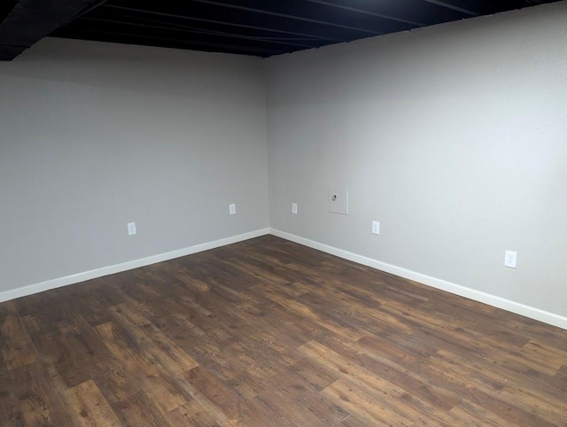 2205 S Owing St, Oak Grove, MO 64075 - empty room with dark wood-type flooring and baseboards